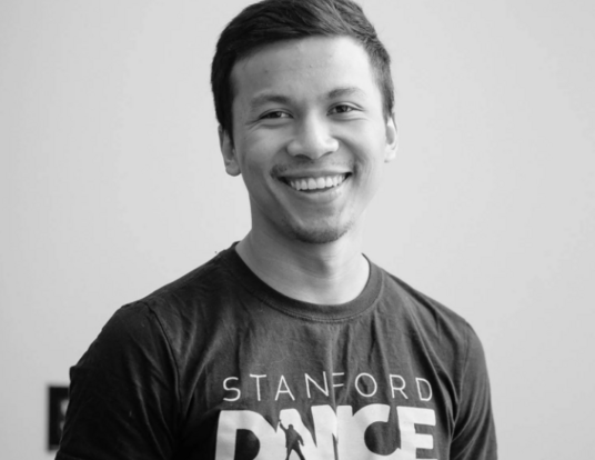 Black and white photo of graduating student Nghia Nguyen.