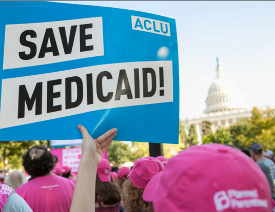 Save Medicare sign at a protest