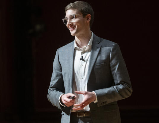 Mack FitzPatrick speaking onstage