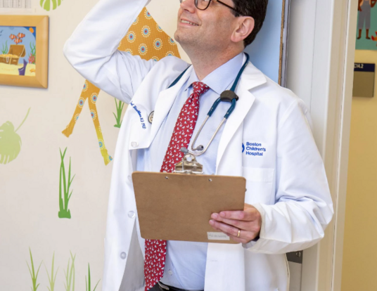 Geneticist Joel Hirschhorn learns he’s five feet, nine inches tall — with shoes on.