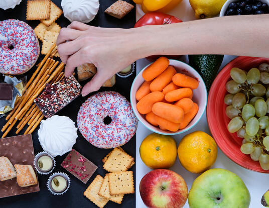 Food tray with hand over it