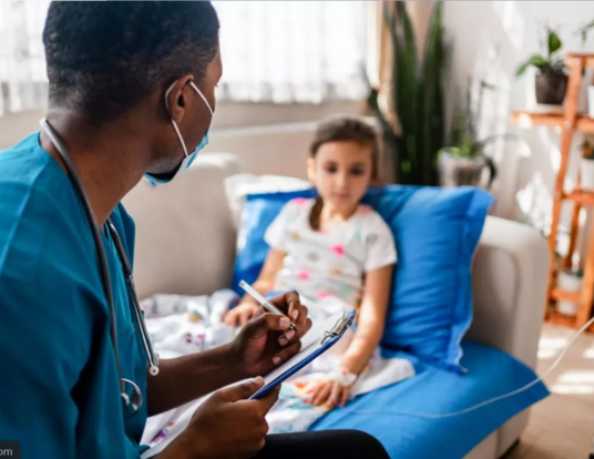 Pediatric nurse speaking with child