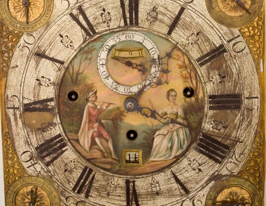 18th century, gold-gilded clock face from Harvard Art Museum