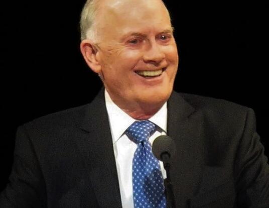 Kim B. Clark speaking at a BYU devotional.