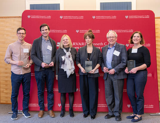 Winners in front of GSAS backdrop