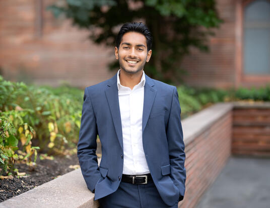 Avinash Moorthy in blue suit