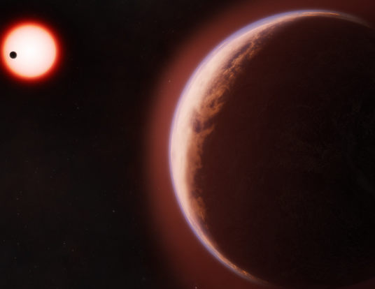Artist's conceptualization shows the exoplanet LHS 1140 b in the foreground surrounded by a helium-rich atmosphere. In the distance is its red dwarf star orbited by another rocky planet.