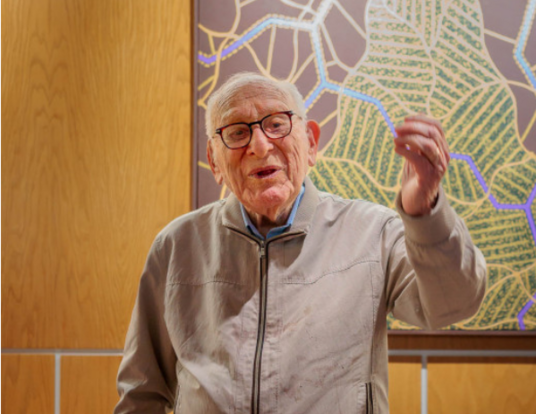 David Bakalar ’47, M.S. ‘48, stood before one of his “Brain Series” paintings, newly installed at Zimmer Hall.