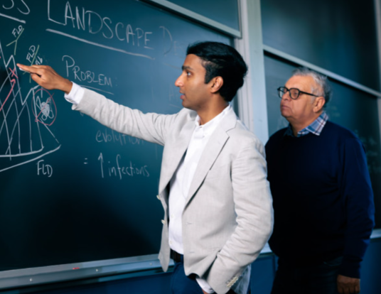 MD/PhD student Vaibhav Mohanty, at left, with Eugene Shakhnovich, Roy G. Gordon Professor of Chemistry, illustrate their fitness landscape design.