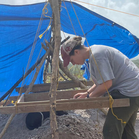 Michel on an archaeological dig in Belize