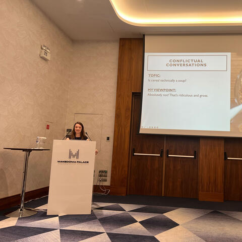 Hanne Collins at a podium