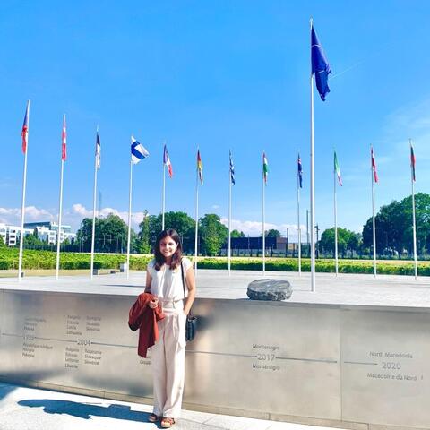Katherine Irajpanah in front of NATO headquarter
