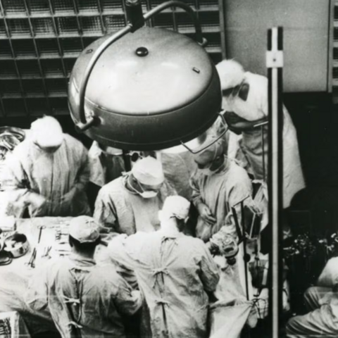 Dr. Joseph E. Murray, at center facing camera, is seen performing the first successful organ transplant on Dec. 23, 1954, at Peter Bent Brigham Hospital in Boston.