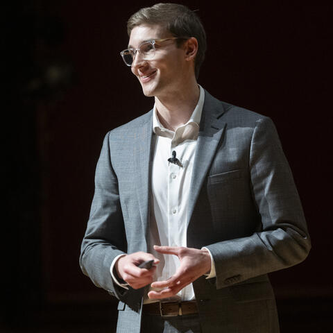 Mack FitzPatrick speaking onstage