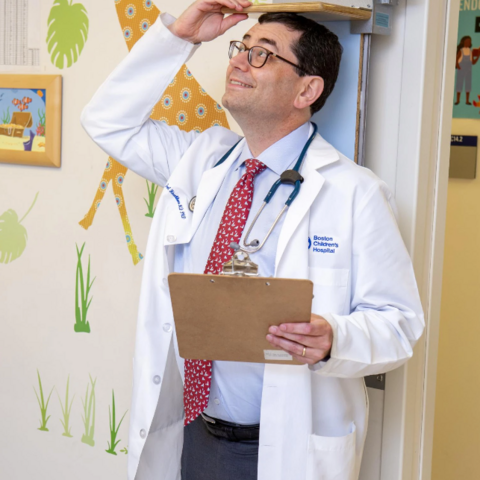 Geneticist Joel Hirschhorn learns he’s five feet, nine inches tall — with shoes on.