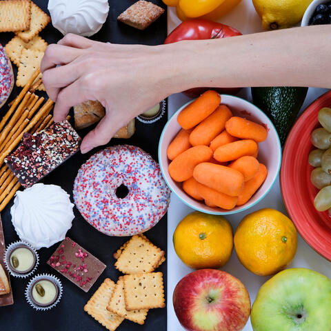 Food tray with hand over it