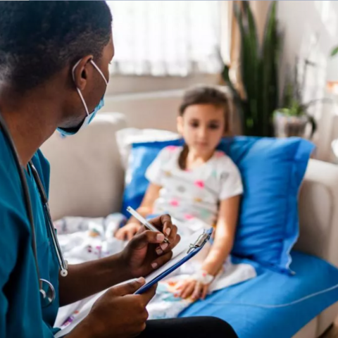Pediatric nurse speaking with child