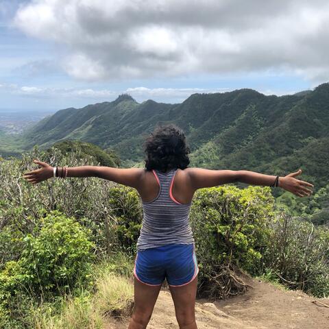 Swathi Srinivasan overlooks mountains in Hawaii