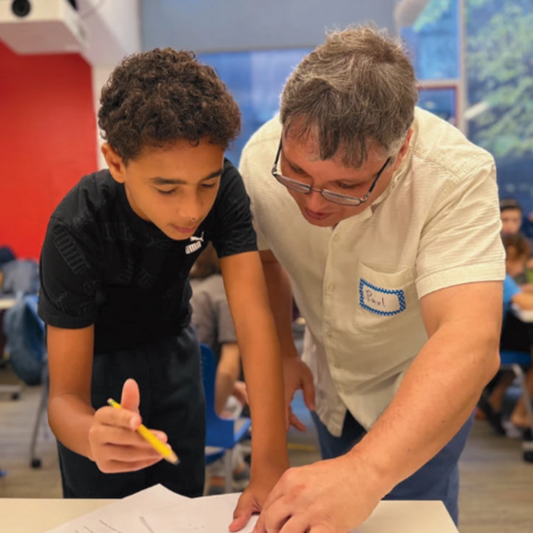 CMC instructor working with a young student