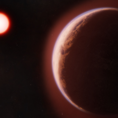 Artist's conceptualization shows the exoplanet LHS 1140 b in the foreground surrounded by a helium-rich atmosphere. In the distance is its red dwarf star orbited by another rocky planet.