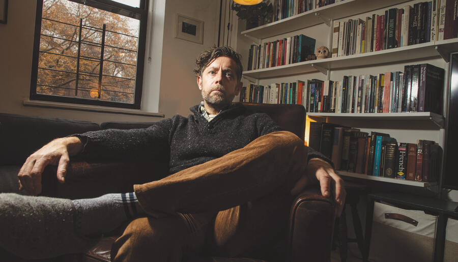 Ben Dunning sitting on chair