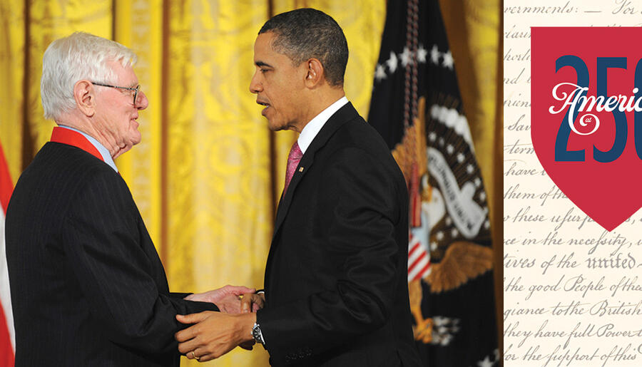 Wood and Obama shaking hands; 250th logo on top of shield shape sitting over the Declaration of Independence