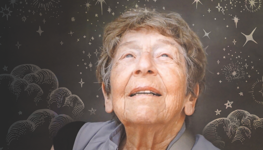 Margaret Kivelson, surrounded by celestial illustrations