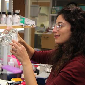 PhD student Anastasia Repouliou in the lab