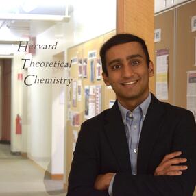 Photo of PhD student Vaibhav Mohanty in front of the door to Harvard's Department of Theoretical Chemistry