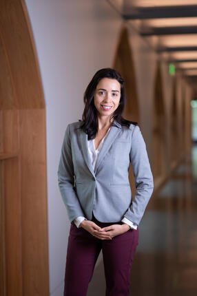 Martha Muñoz standing near wall