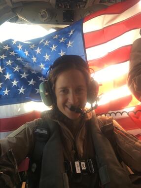 Roni Yadlin inside the B-1 with American flag behind her