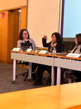 Garza as a panel moderator 