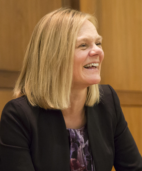 Dean Emma Dench smiling during an event discussion