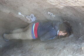 Melina in a trench