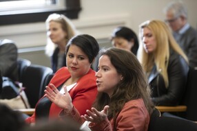 Woman poses a question from the audience