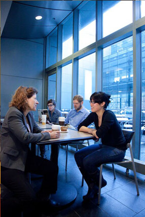 Individuals sitting at table