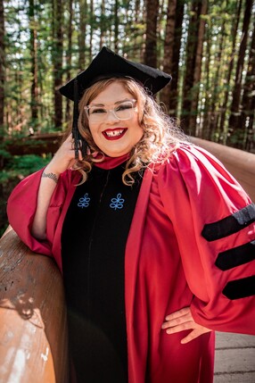 Blythe George in PhD Regalia 