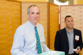 David Jones holds a blue box containing his Mendelsohn award.