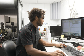 GSAS student Matt Smith works on a computer