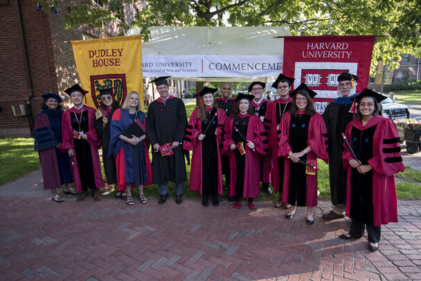 The Commencement Marshals and GSAS administrators pose together outside