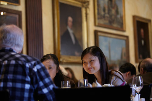 Students at dining table in Harvard's Faculty Club