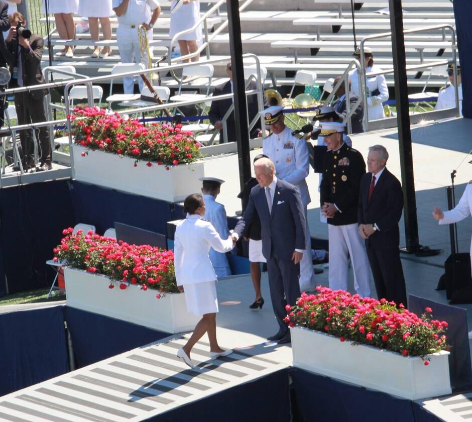 Berry shaking hands with President Biden